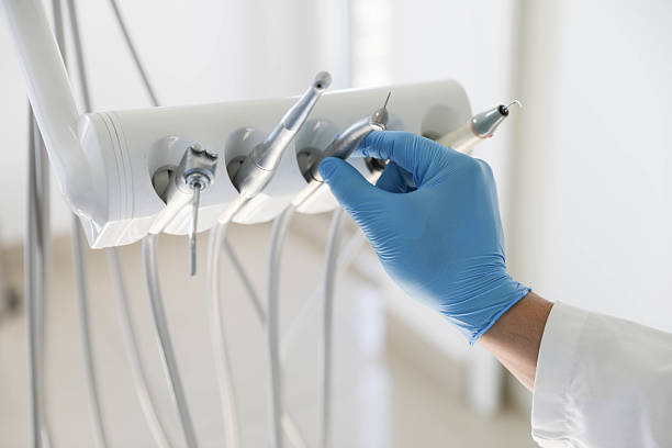 Professional Tooth Extraction technician working in Northville, MI